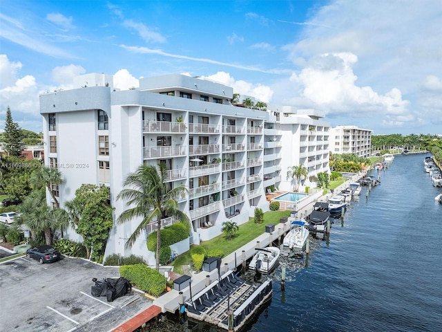 view of building exterior with a water view