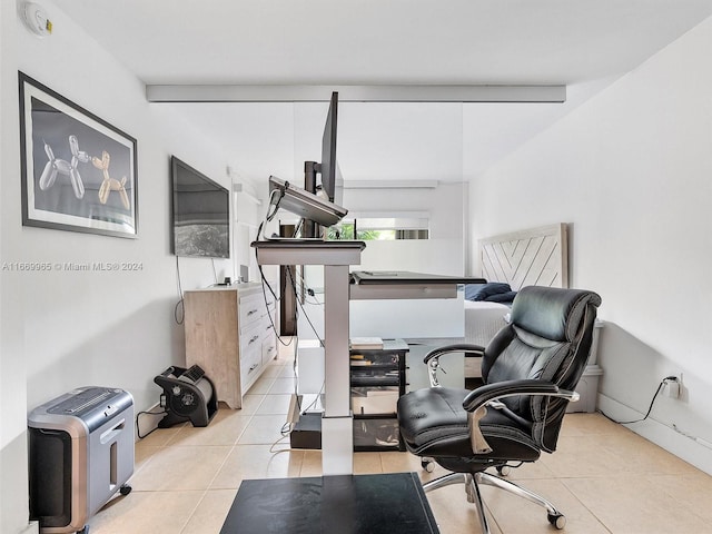 tiled office featuring beam ceiling