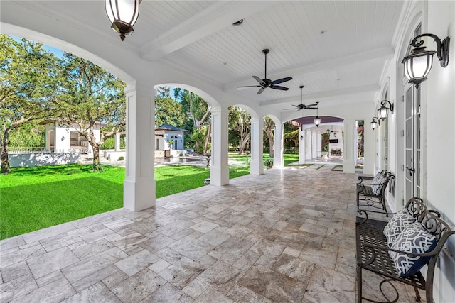 view of patio featuring ceiling fan