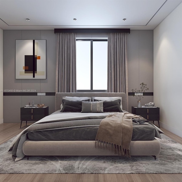 bedroom featuring hardwood / wood-style flooring