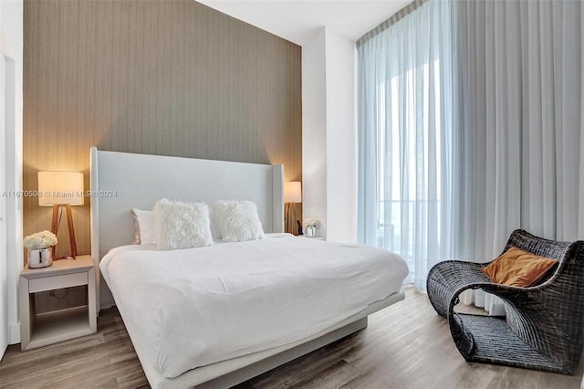 bedroom featuring wood-type flooring