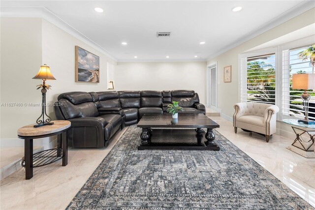 living room with ornamental molding