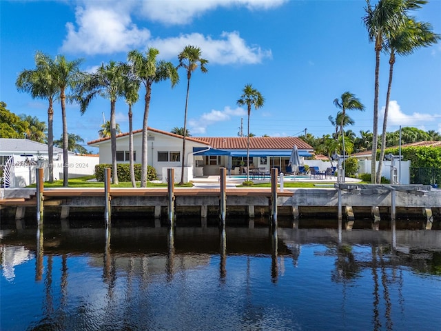 dock area with a water view