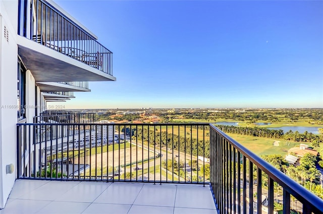 balcony featuring a water view