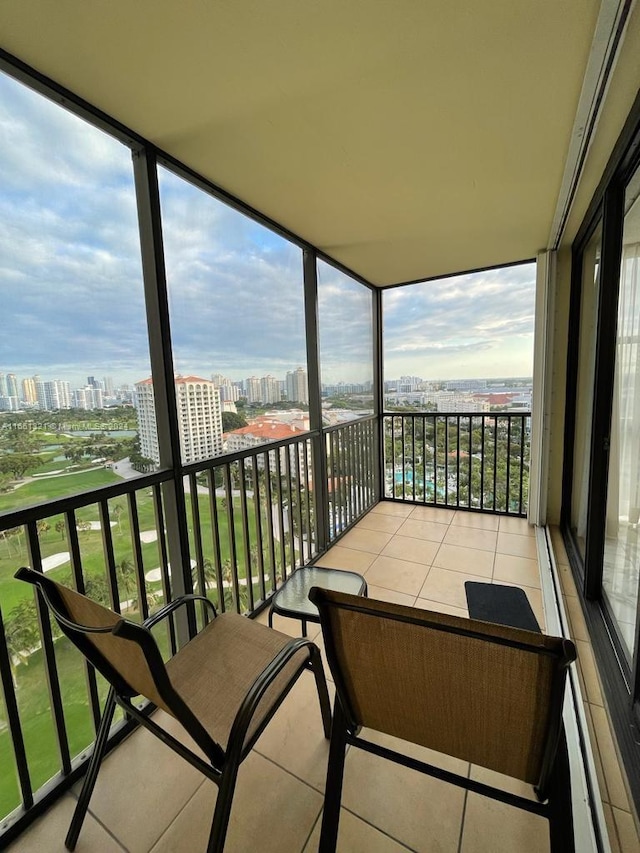 balcony featuring a baseboard heating unit