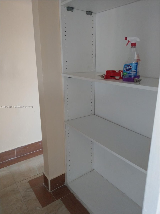 bathroom with tile patterned flooring