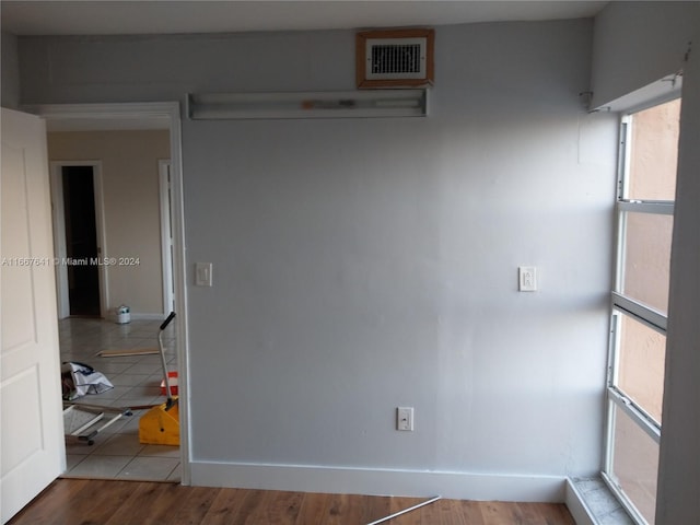 empty room featuring wood-type flooring