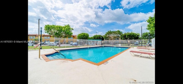 view of pool with a patio