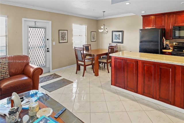 kitchen with pendant lighting, a chandelier, black appliances, light tile patterned floors, and ornamental molding