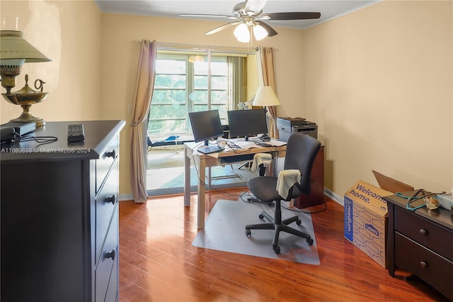 office with ceiling fan, hardwood / wood-style flooring, and crown molding