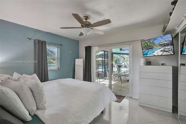 bedroom with ceiling fan, multiple windows, and access to outside