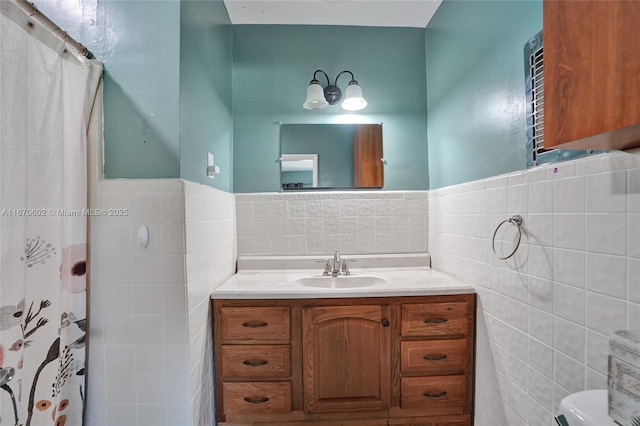 bathroom featuring vanity, tile walls, walk in shower, and toilet