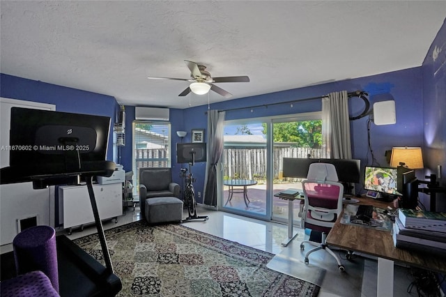 tiled home office featuring ceiling fan, a wall mounted air conditioner, and a textured ceiling