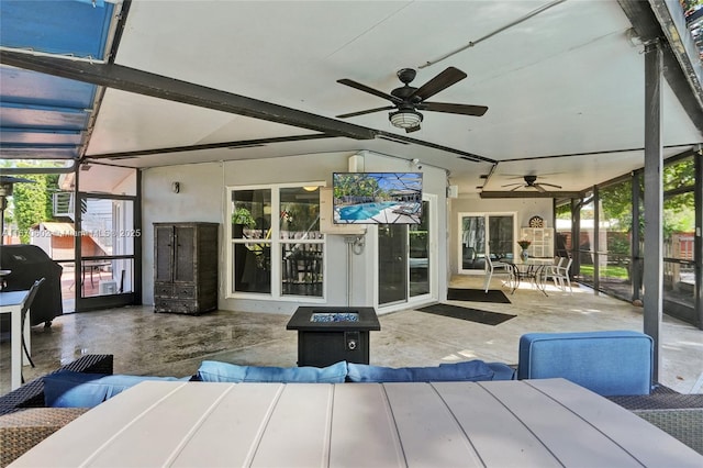 exterior space featuring ceiling fan