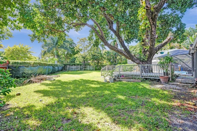 view of yard featuring a lanai