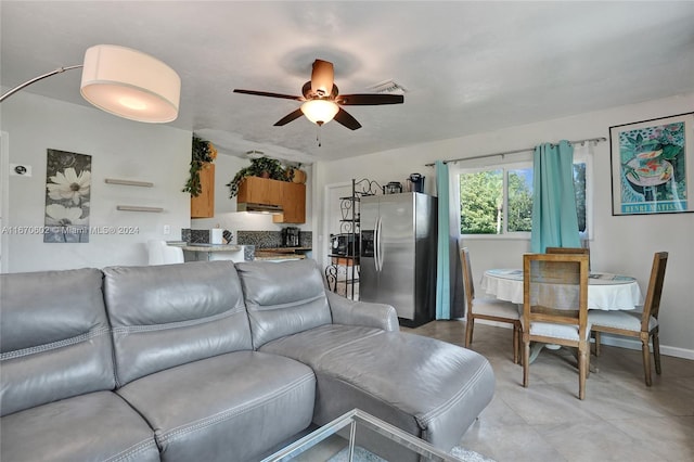 living room with ceiling fan