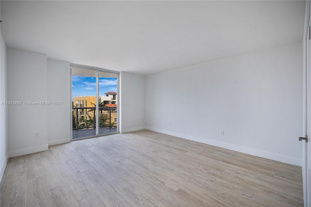 empty room featuring light hardwood / wood-style floors