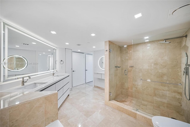 bathroom with vanity and an enclosed shower