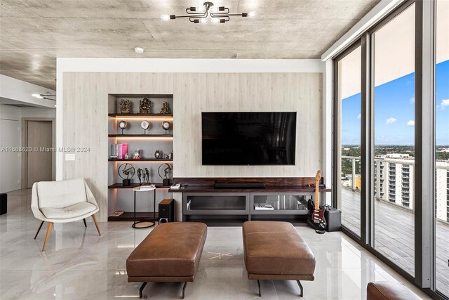 living room with floor to ceiling windows