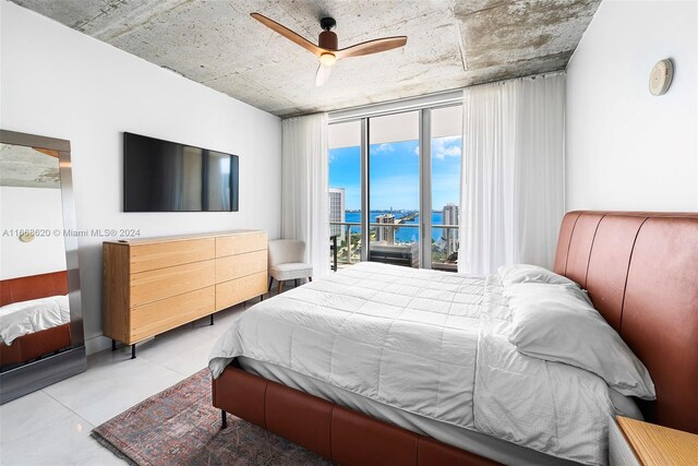 bedroom featuring ceiling fan and access to outside