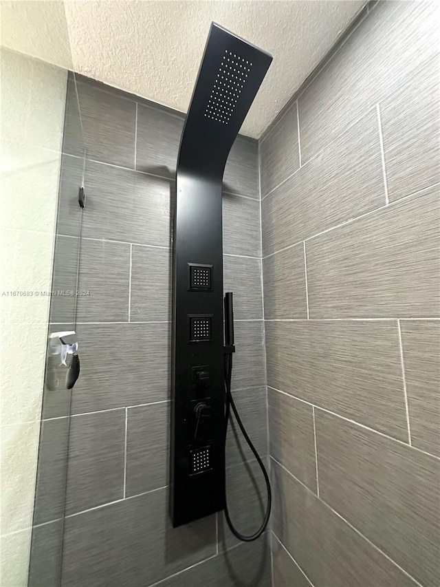 details featuring a tile shower