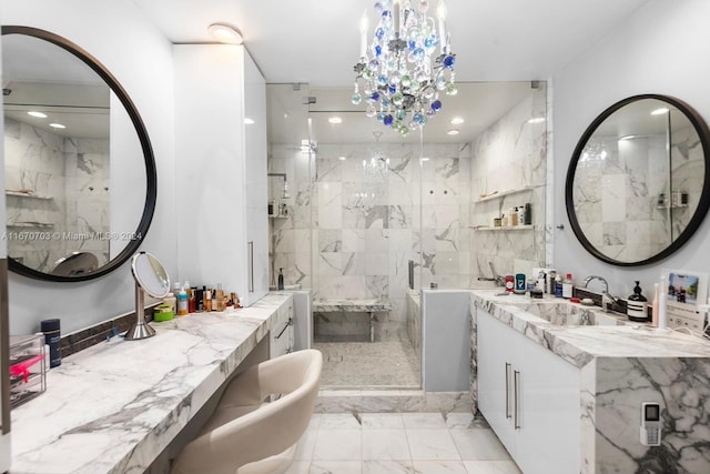 bathroom with vanity, a chandelier, and walk in shower