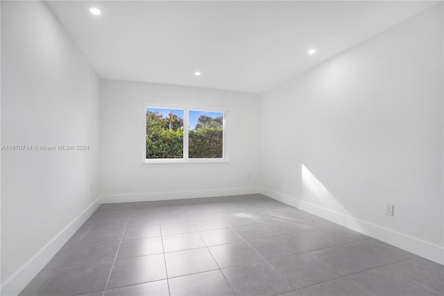 view of tiled spare room