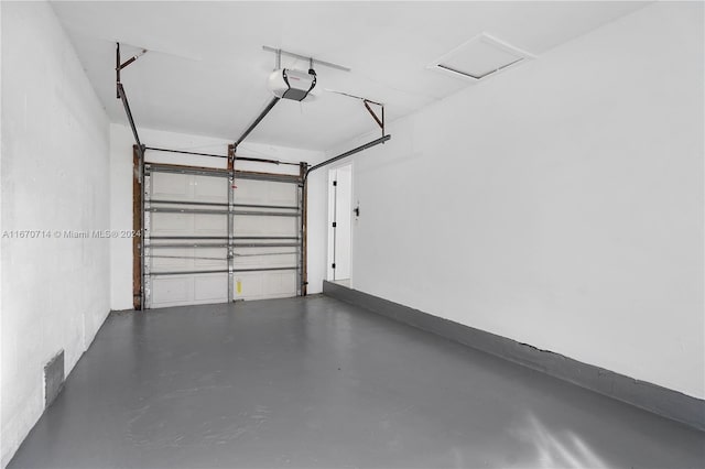 garage featuring a garage door opener