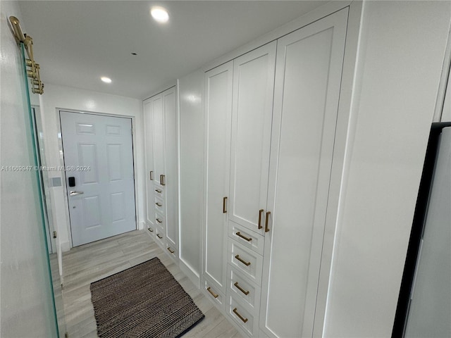 doorway to outside featuring light wood-type flooring