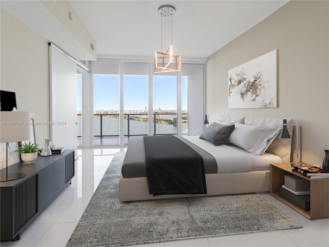 tiled bedroom with access to exterior, a water view, and floor to ceiling windows