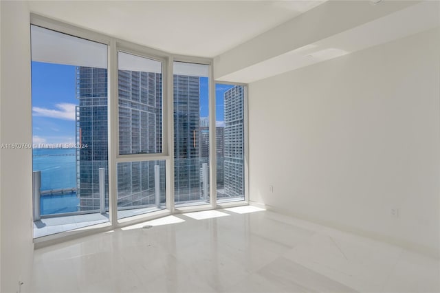 empty room with floor to ceiling windows