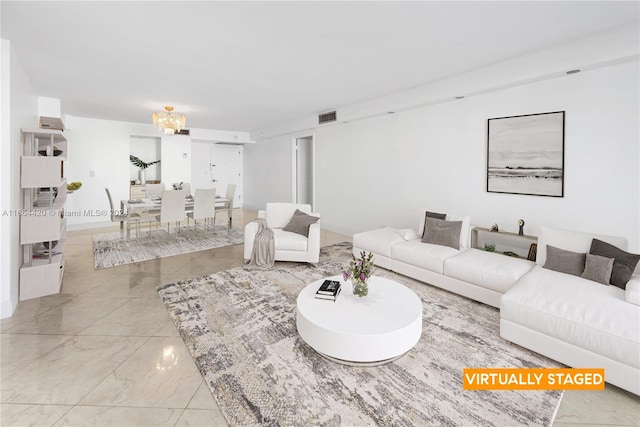 living room with a notable chandelier