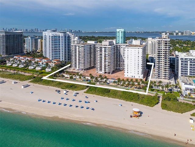 aerial view with a view of the beach and a water view