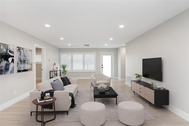 living room featuring light hardwood / wood-style flooring