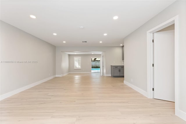 unfurnished living room featuring light wood-type flooring