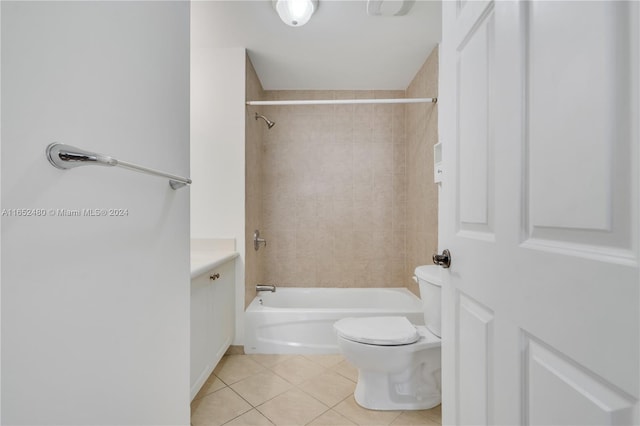 full bathroom with vanity, toilet, tile patterned floors, and tiled shower / bath