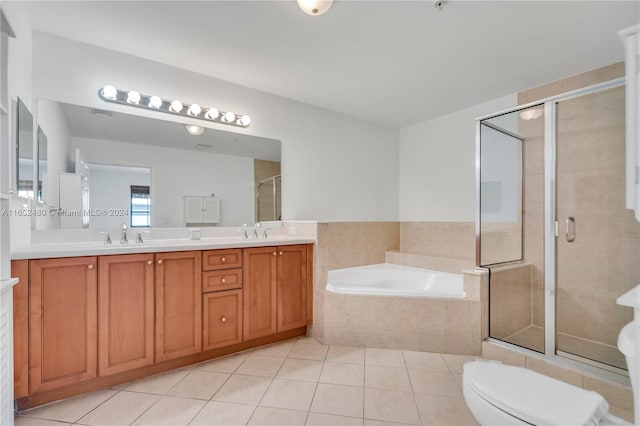 full bathroom featuring separate shower and tub, tile patterned flooring, vanity, and toilet