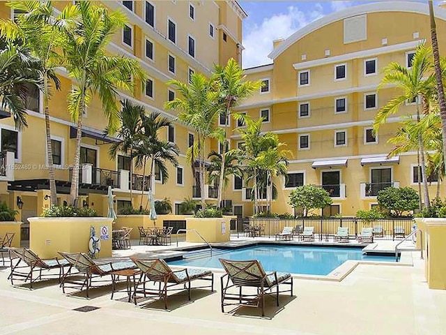 view of swimming pool featuring a patio