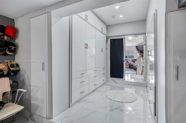 bathroom with ceiling fan