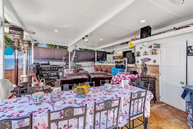 dining area with concrete flooring