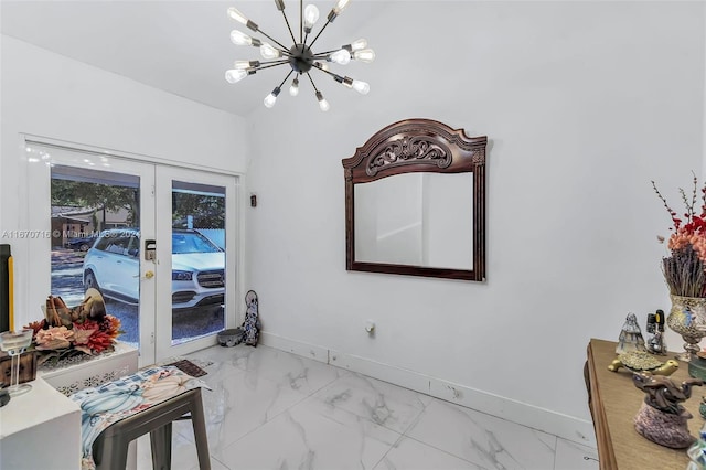 interior space featuring an inviting chandelier and french doors