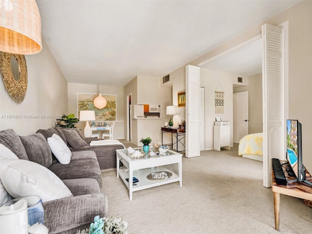 living room featuring light colored carpet