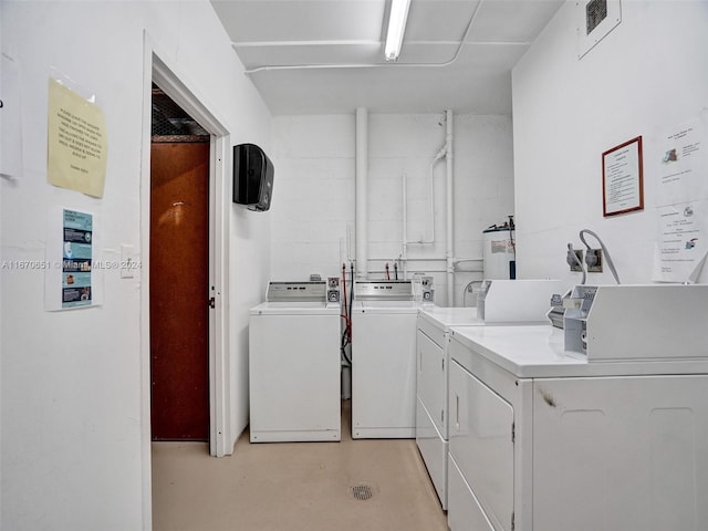 laundry area with washer and clothes dryer