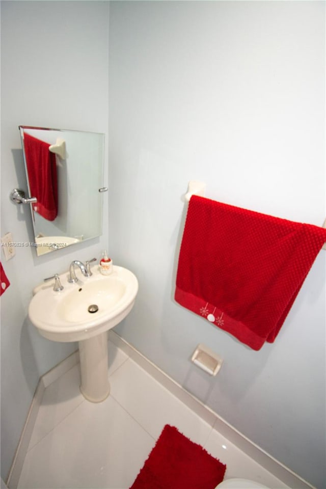 bathroom with tile patterned flooring