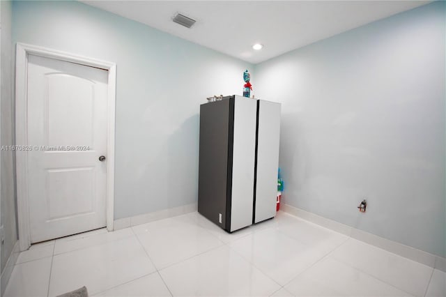 interior space featuring light tile patterned floors