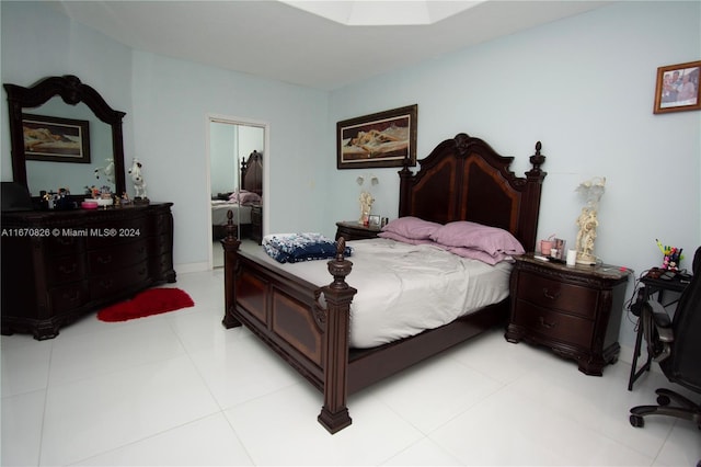 bedroom featuring light tile patterned floors