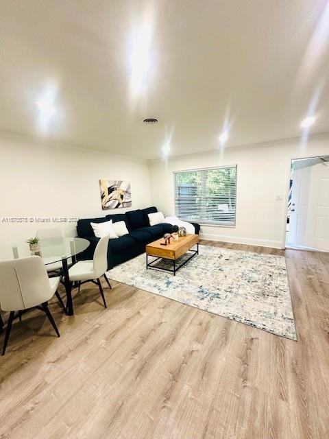 living room featuring light hardwood / wood-style floors