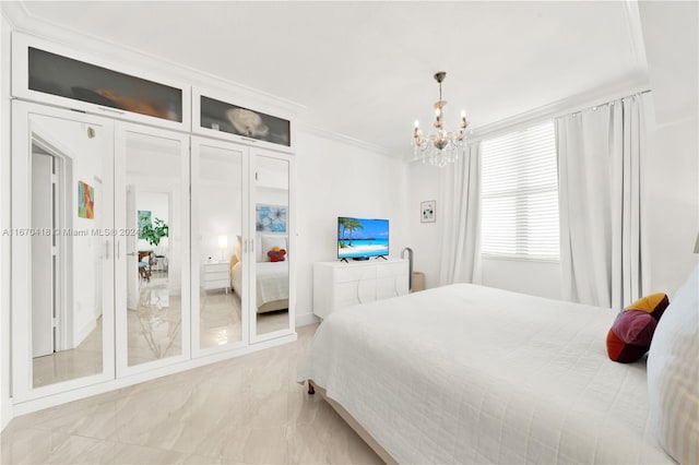 bedroom featuring a chandelier and crown molding