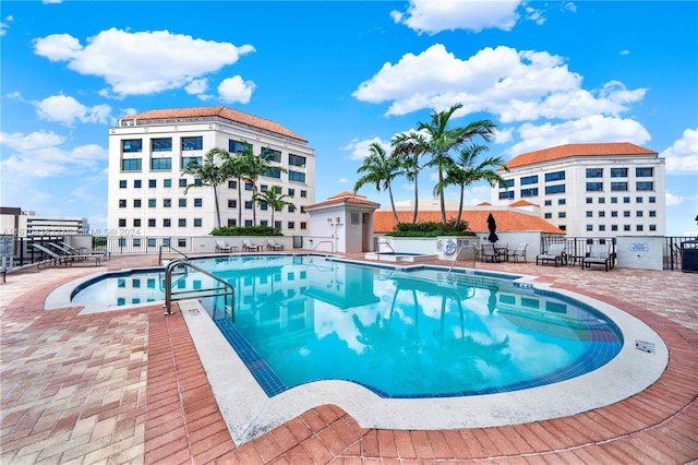 view of swimming pool featuring a patio