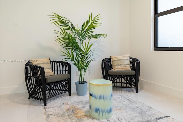 living area featuring tile patterned flooring